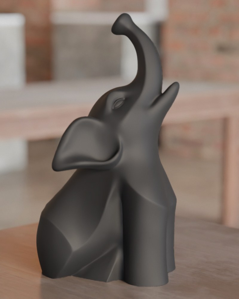 Sculpture d'éléphant noir moderne aux courbes douces et aux détails géométriques, vue de face