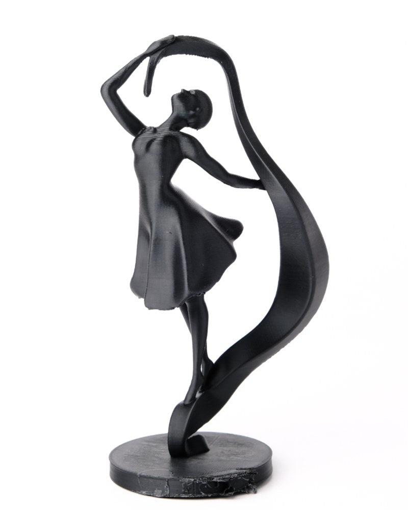 Sculpture élégante de danseuse blanche à la forme de ruban, vue de face