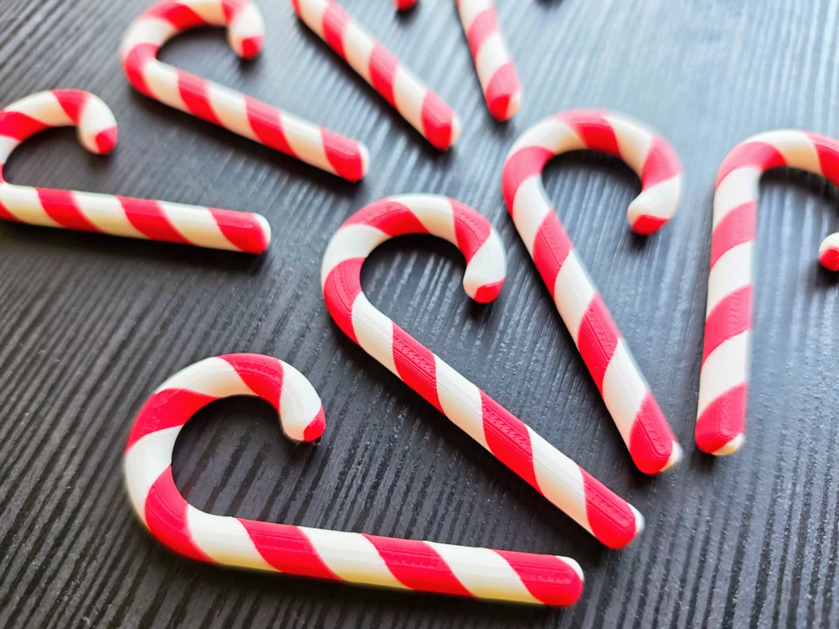 Huit sucres d'orge bicolores pour le sapin