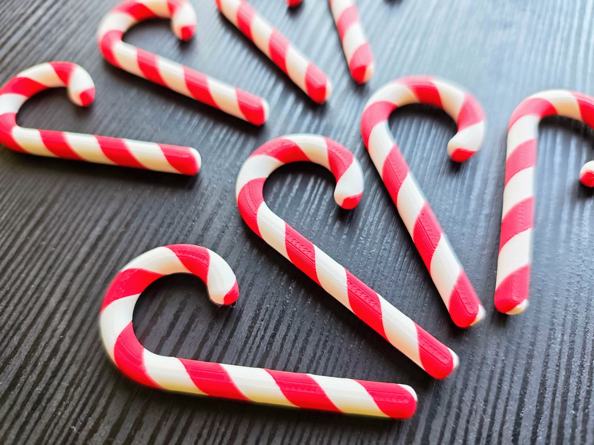 Huit sucres d'orge bicolores pour le sapin