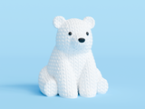 Gros plan de la texture tricotée d'une figurine d'ours polaire blanc
