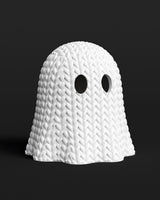 Gros plan sur le motif ajouré d'un fantôme façon tricot à l'aspect crocheté