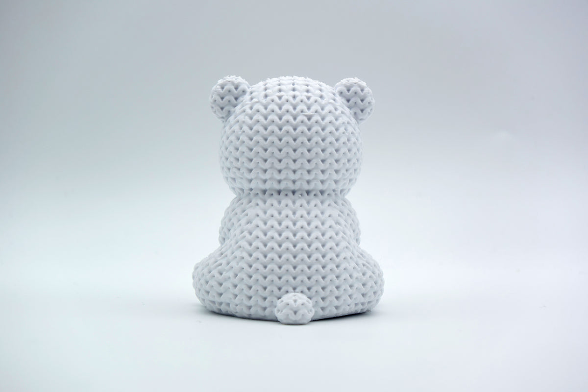 Détail de texture de l'ours polaire façon tricot au motif entrelacé sur le dos