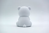 Détail de texture de l'ours polaire façon tricot au motif entrelacé sur le dos