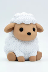 Gros plan d'un petit mouton tricoté blanc, aspect crocheté