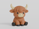 Gros plan d'une vache Highland tricotée au pelage crocheté et aux petites cornes sculptées