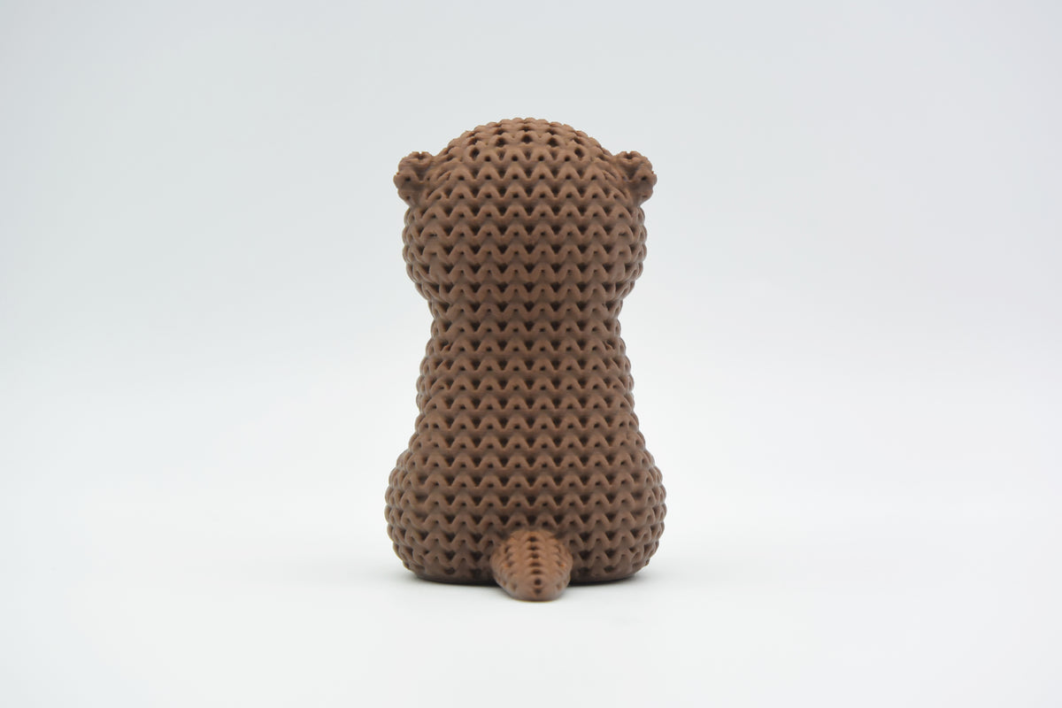 Détail de texture de la loutre façon tricot au motif de boucles tissé, aspect crocheté main