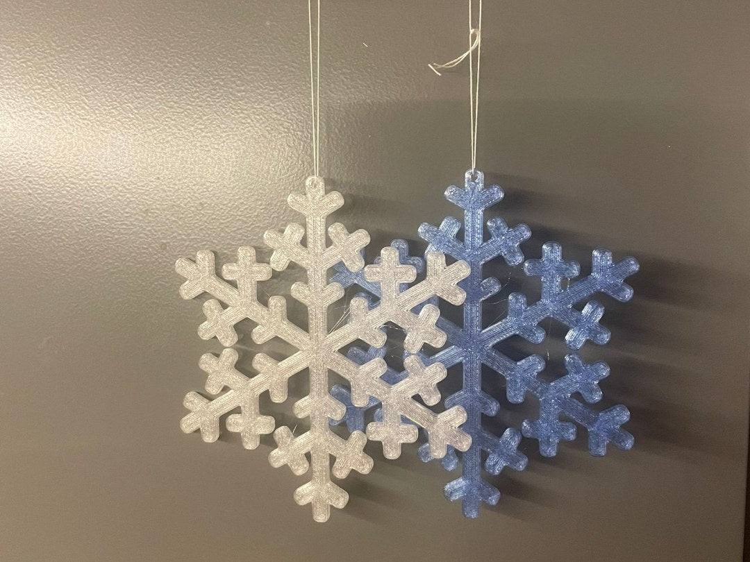 Flocon de neige pour le sapin avec trou pour crochet