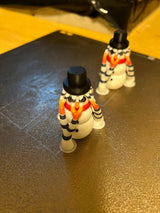 Petite figurine de bonhomme de neige en plusieurs couleurs