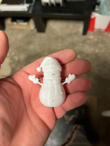 Figurine bonhomme de neige avec écharpe, gants et chapeau