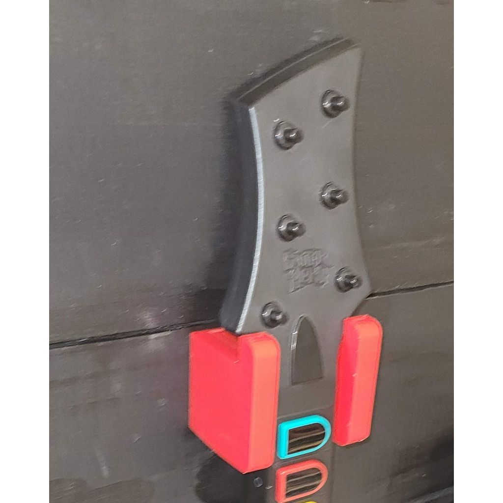 Support mural pour manette Guitar Hero avec rebord de blocage
