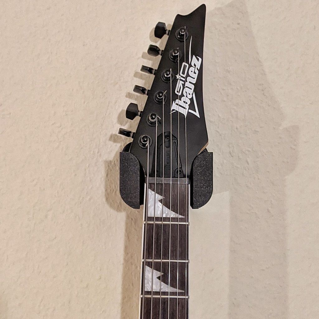 Support mural simple et robuste pour guitare électrique