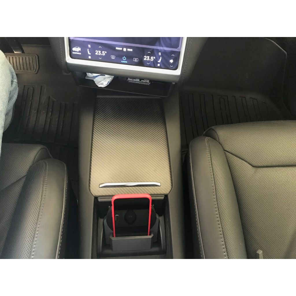 Base pour chargeur sans fil dans la console centrale de Tesla Model X