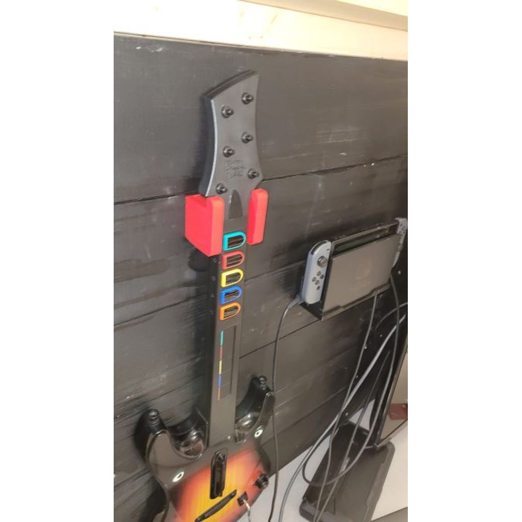 Support mural pour manette Guitar Hero avec rebord de blocage