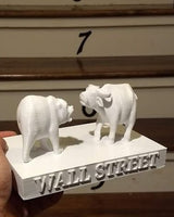 Statue Wall Street avec ours contre taureau
