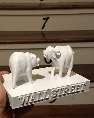 Statue Wall Street avec ours contre taureau
