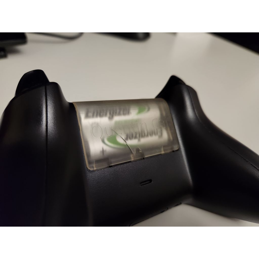 Cache-batterie Xbox avec logo et symbole d'éjection